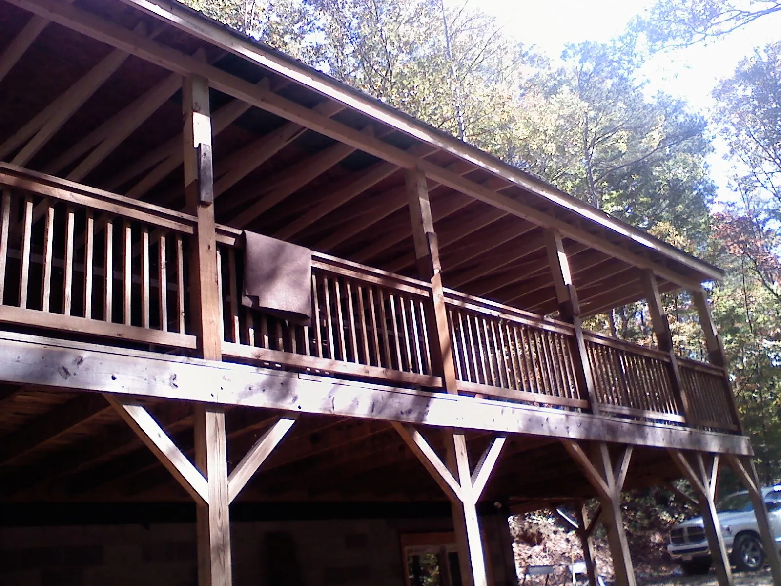 Timber framing under a new elevated porch and deck — Roof Leak Repair in Hood River by Roofing Brothers